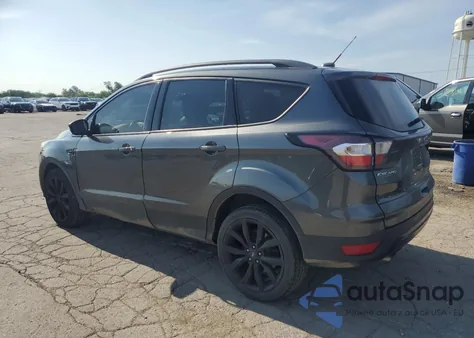 2017 Ford Escape Titanium z USA, uszkodzony, nr VIN 1FMCU9J99HUE93325